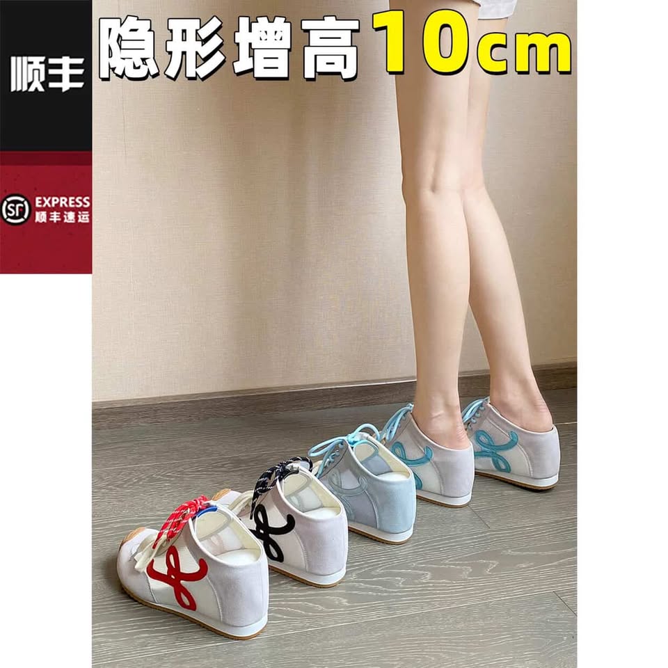 Pair of shoes with text indicating height increase on a plain background
