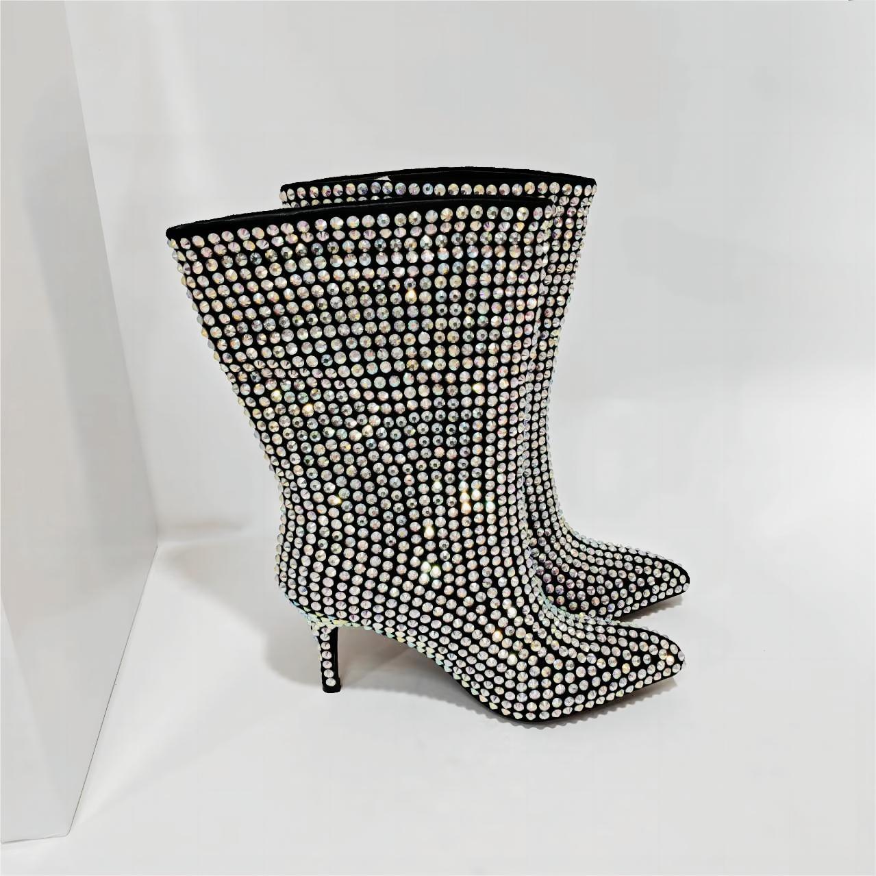 Glamorous, rhinestone-covered stiletto boots for women, perfect for making a bold fashion statement.
