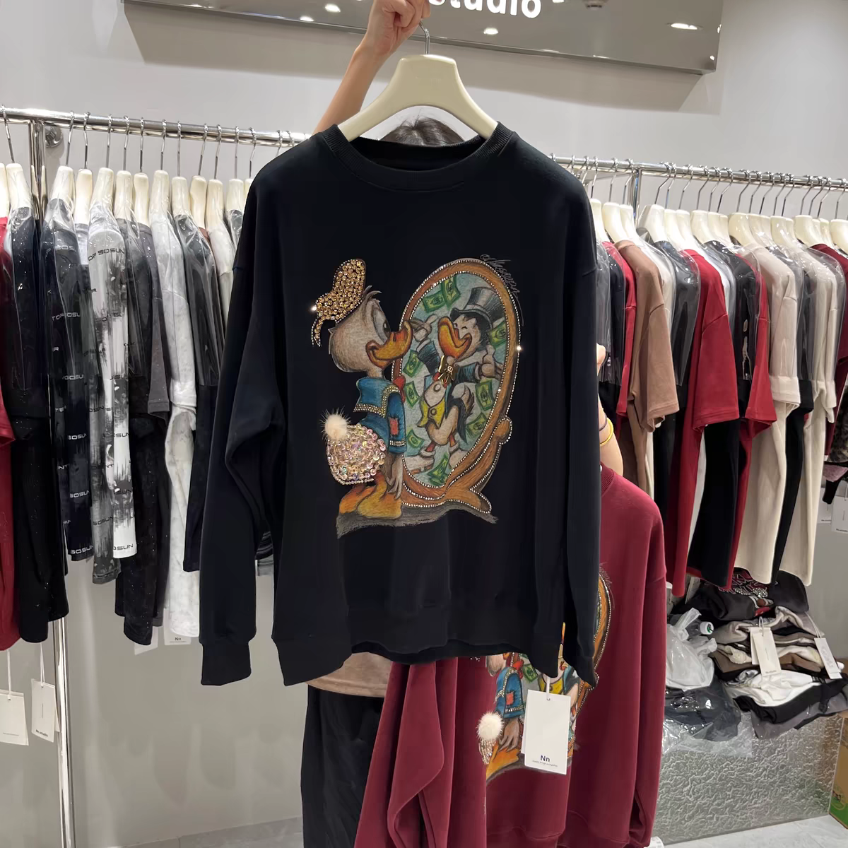 Samysfashionhouse 2024 new autumn and winter sweatshirts for women goods heavy industry cartoon Donald Duck foreign style loose mid-length tops and jackets hoodie sweatshirts trendy SAM60