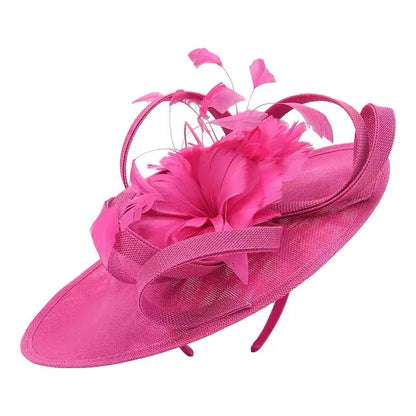 Fuchsia pink fascinator hat close-up product photo