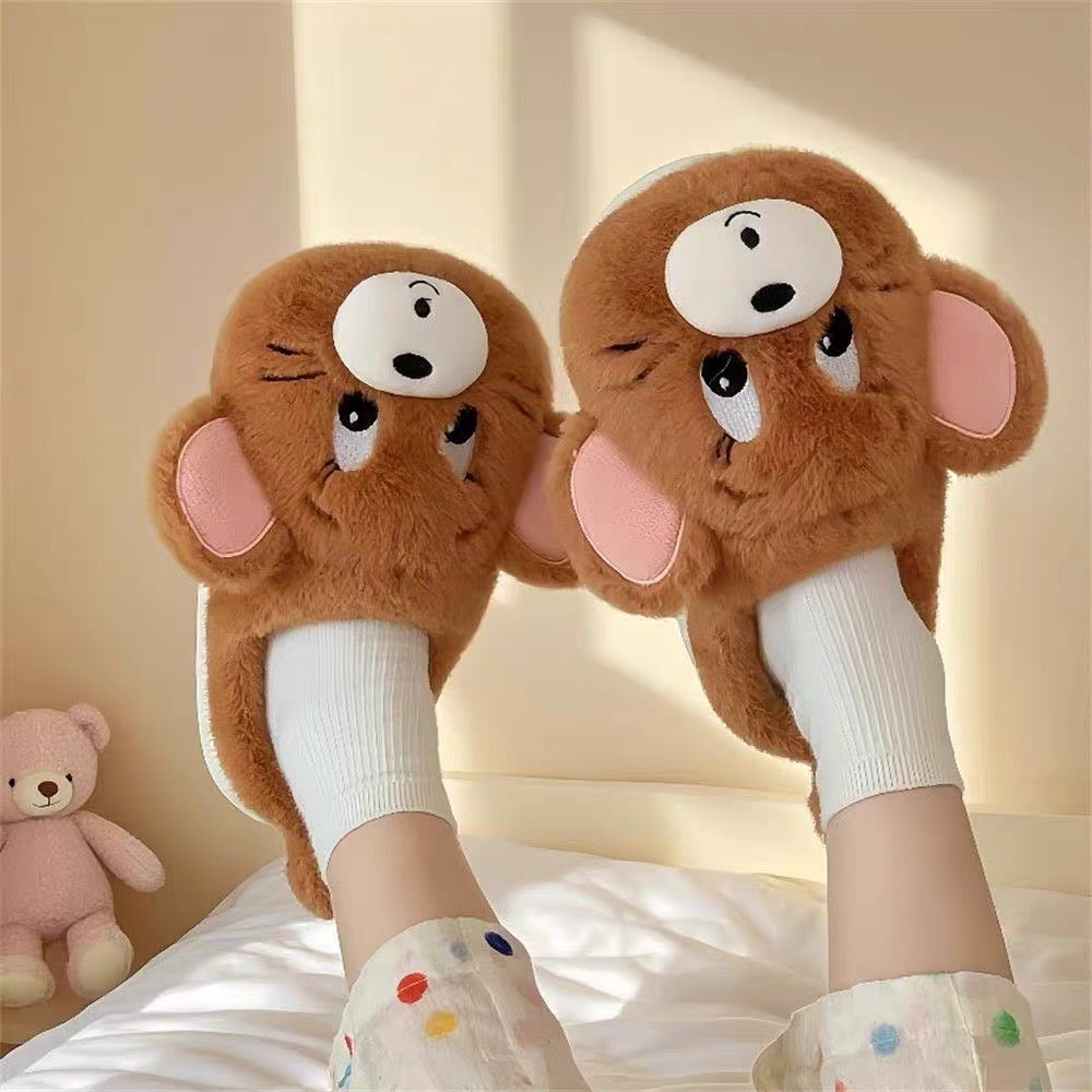 Brown Jerry character plush winter slippers worn with socks