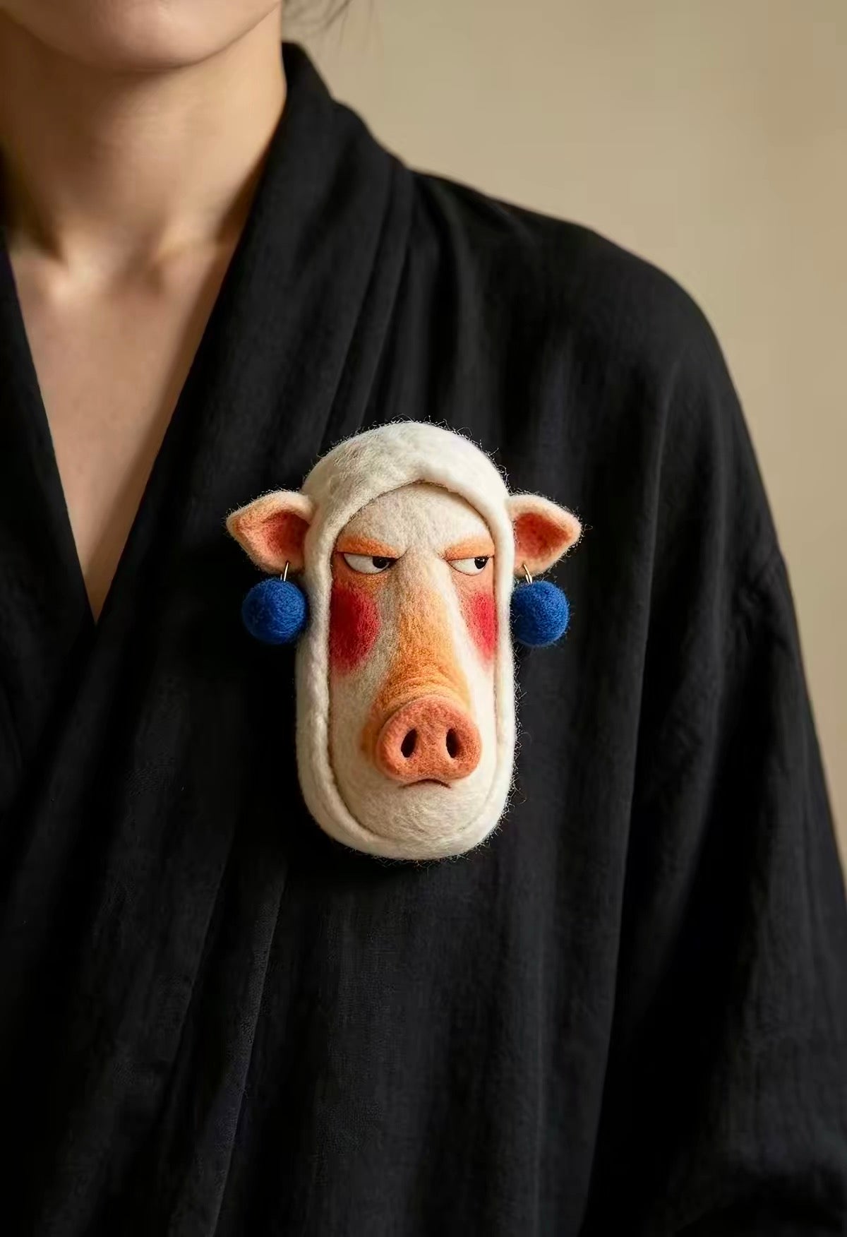 Handmade felt sheep-inspired character brooch with blue pom-pom earrings