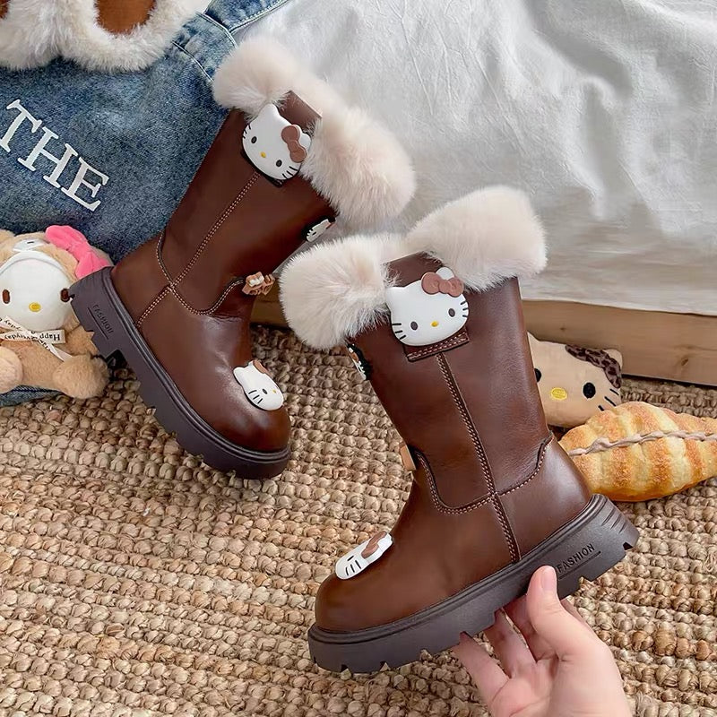 Brown children's Hello Kitty winter boots with fluffy cream fur trim and chunky sole, side view