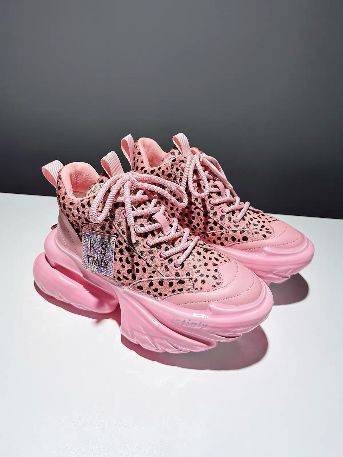 Light pink leopard-print sneakers with sculpted platform soles