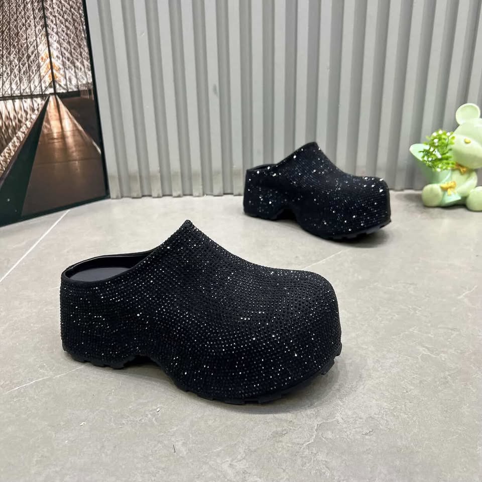 Black glittery clogs 