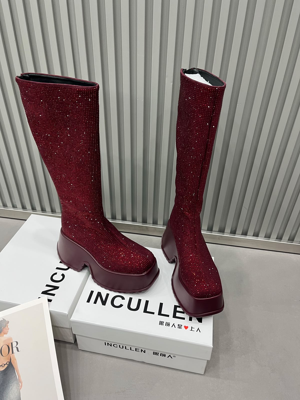 Burgundy sparkling rhinestone knee-high platform boots with matching chunky soles