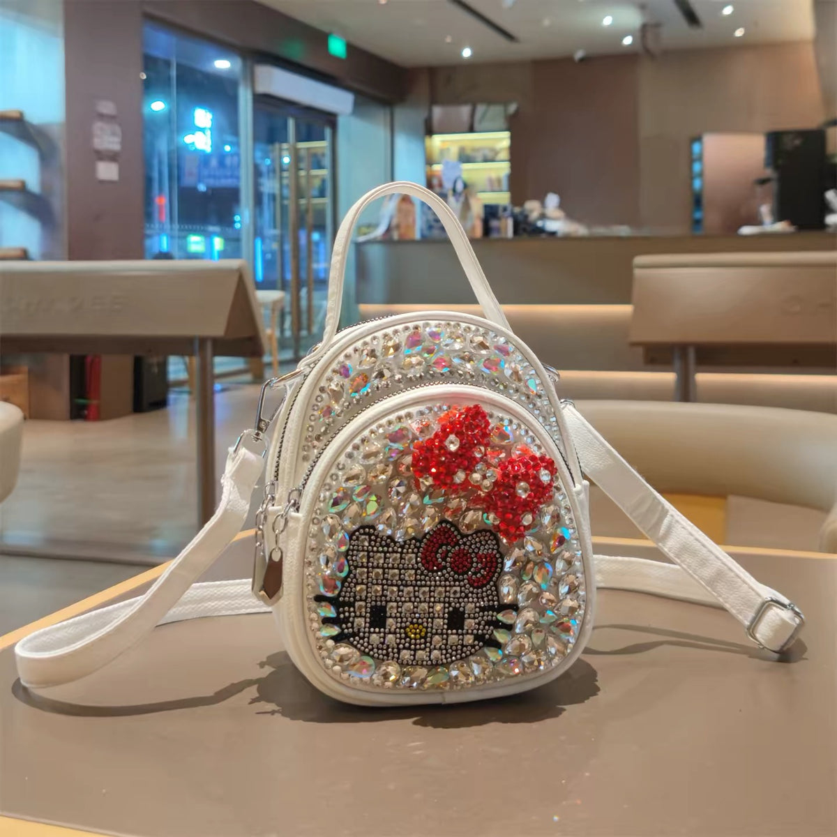 White rhinestone character mini backpack with red bow
