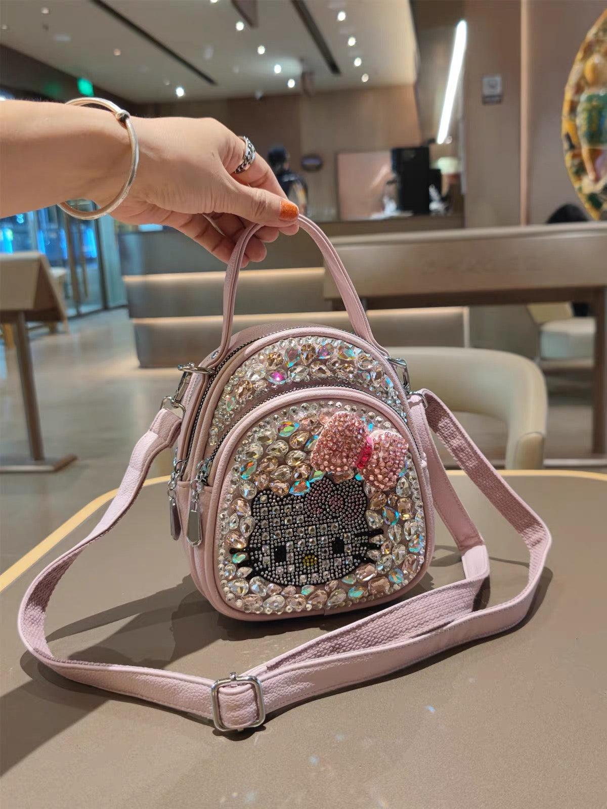 Pink rhinestone character mini backpack with adjustable strap