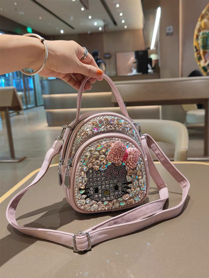 Pink rhinestone character mini backpack with adjustable strap