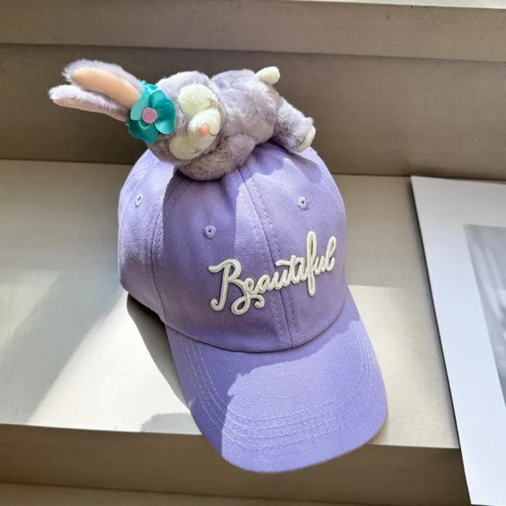 Lavender baseball cap with plush bunny topper