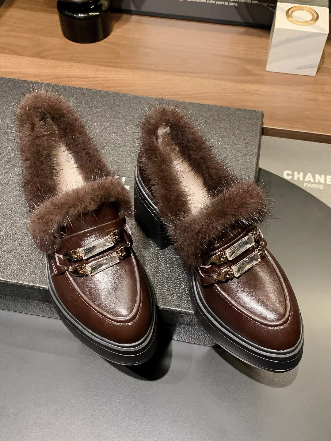 Chocolate brown faux-fur trim crystal buckle loafers pair