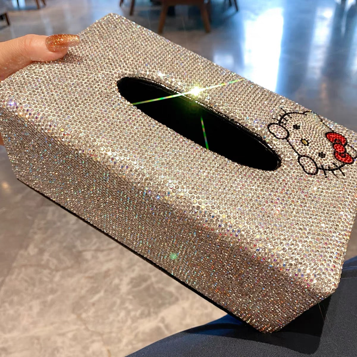 Gold rhinestone Hello Kitty tissue box cover, angled top view