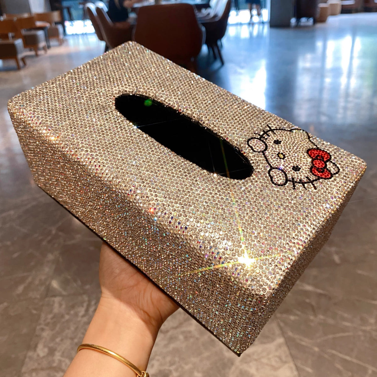 Gold crystal-embellished Hello Kitty tissue box cover, front angled view