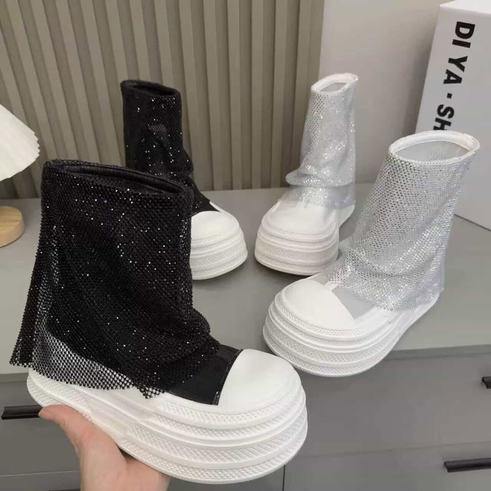Women’s black and white platform sneakers with hidden heel heightening sole