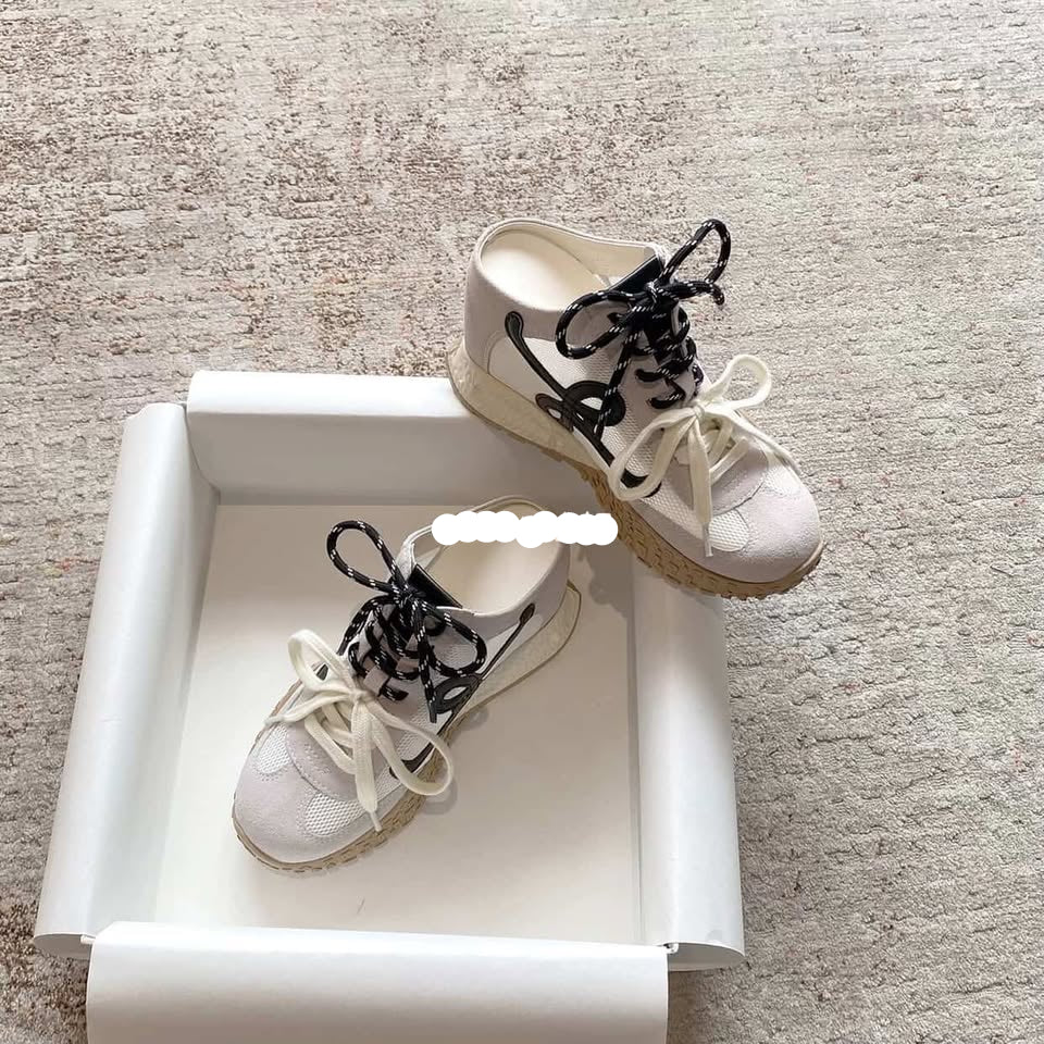 White sneakers with black laces 