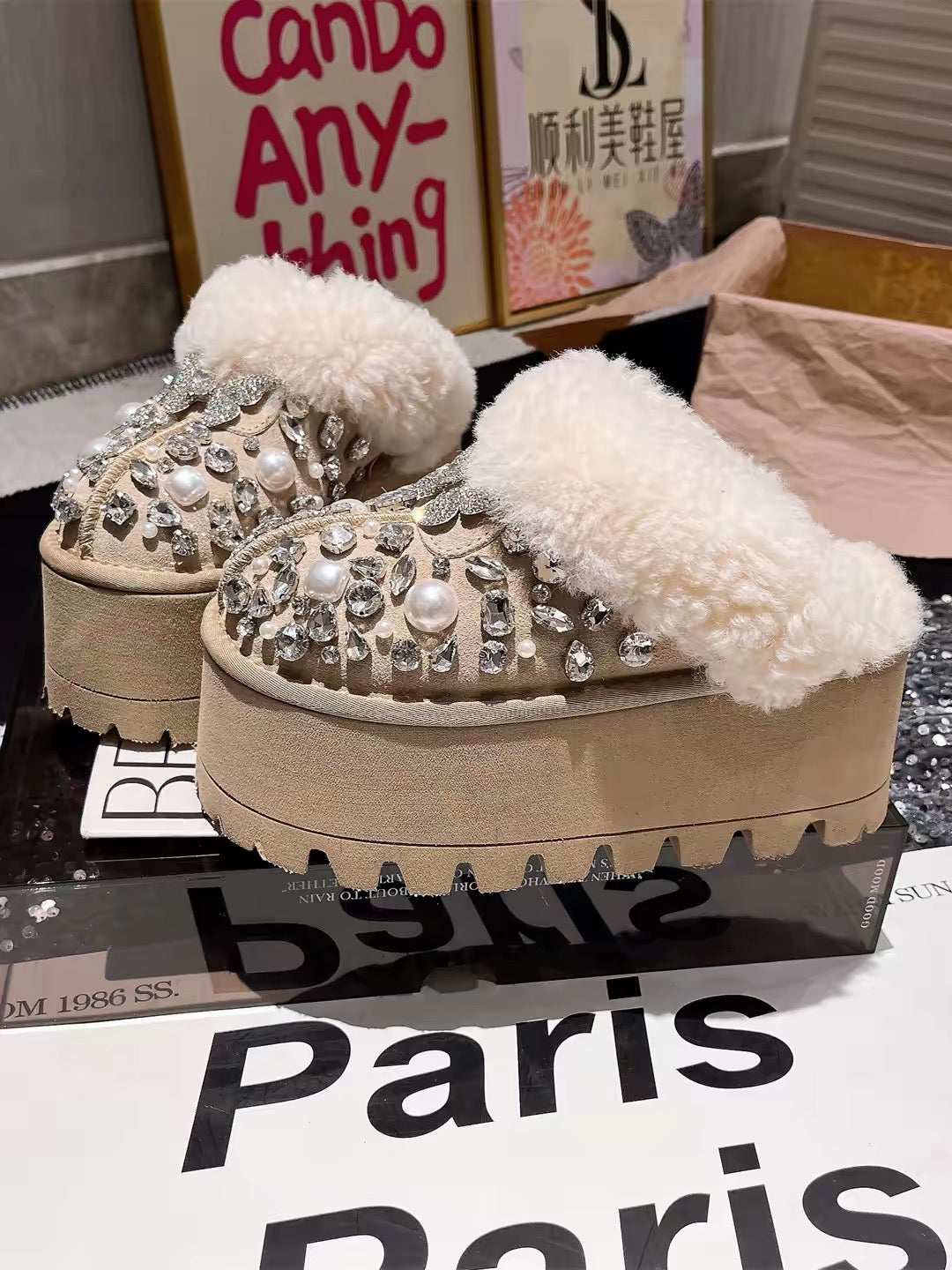 Beige platform mule with pearl and crystal embellishments and plush lining