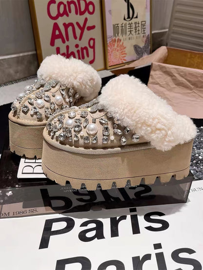 Beige platform mule with pearl and crystal embellishments and plush lining
