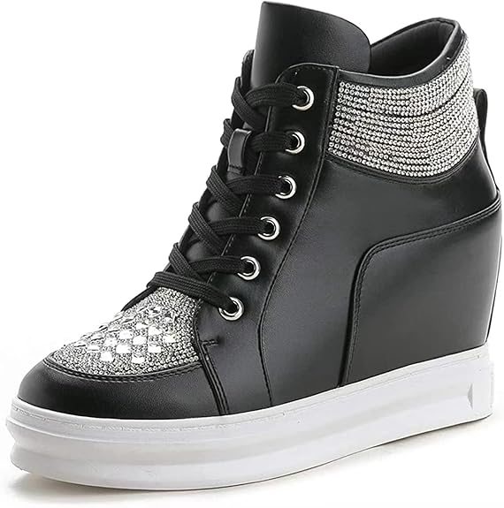 Black high-top sneaker with silver embellishments on a white background