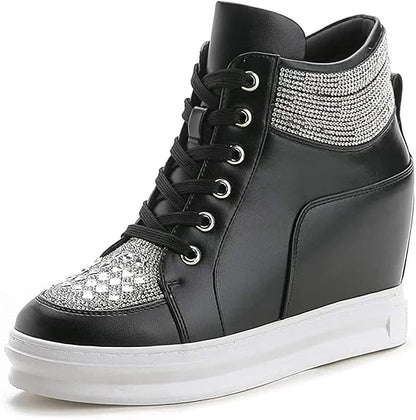 Black high-top sneaker with silver embellishments on a white background