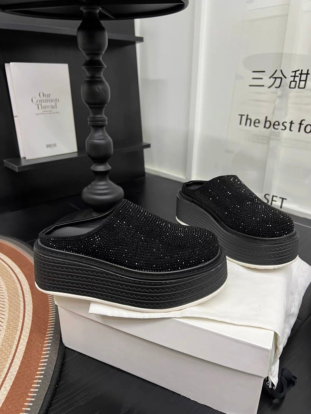 Black rhinestone platform clogs with thick black platform sole